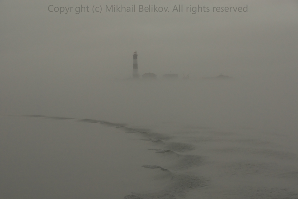 Lighthouse in Rain and Fog
